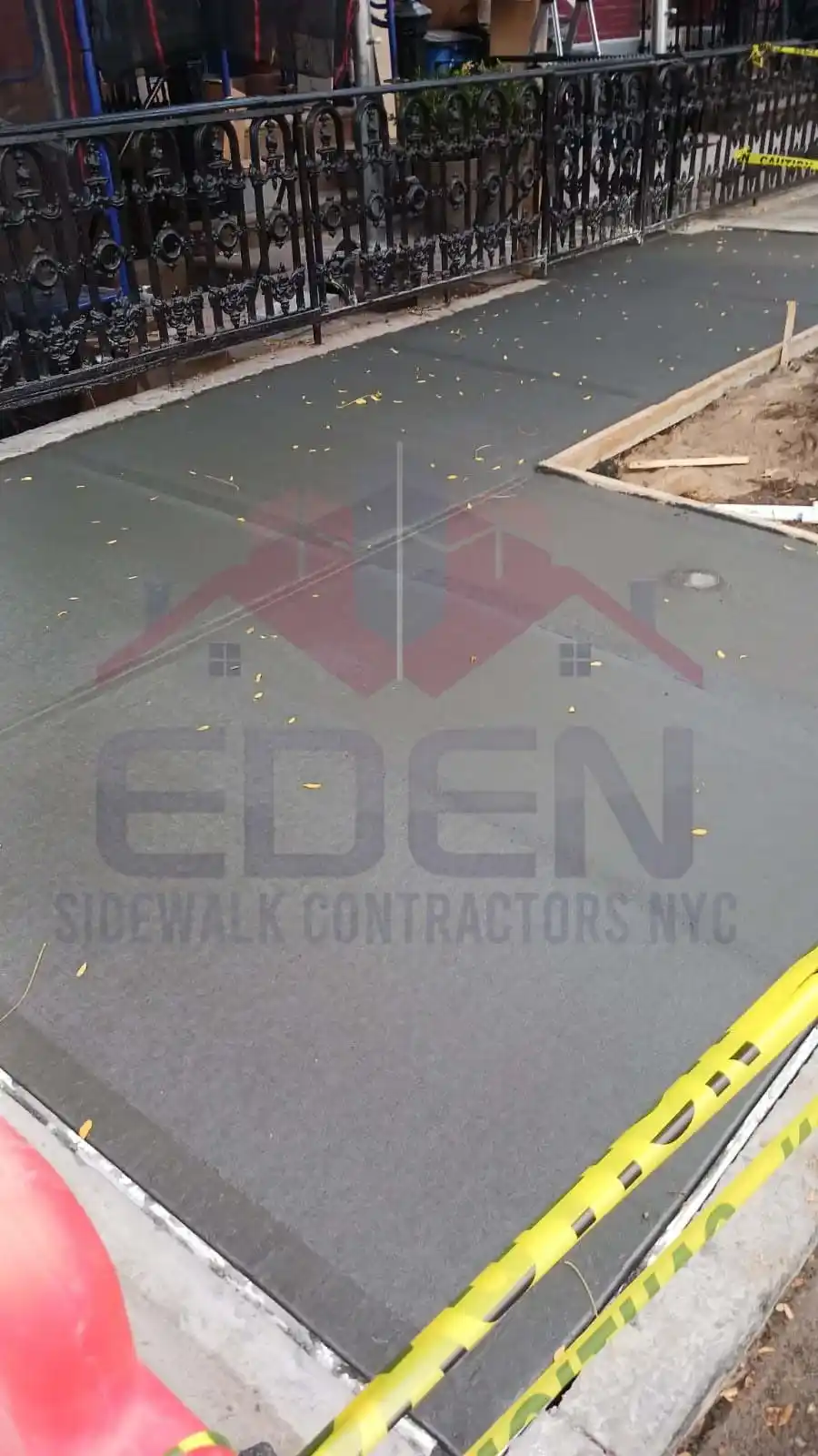 repaired concrete sidewalk in nyc